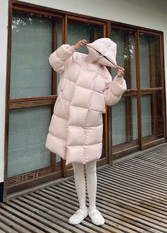 Wrap yourself in luxury with the Trista Pink Hooded Long Down Puffy Coat. This sophisticated coat features a pink zipper for a pop of color and a cozy hood for added warmth. Its long length and down insulation will keep you stylish and comfortable in the coldest weather. Details & care Fixed hood Lined, with 800-fill-power down 90% duck down, 10% feather Nylon Dry clean Women's coat Item #312132 SIZE INFO XS=US2=UK6=EU32 S=US4-6=UK8-10=EU34-36 M=US8-10=UK12-14=EU38-40 L=US12=UK16=EU42 ★★ It woul Pink Down Outerwear For Fall, Pink Down Winter Outerwear, Pink Down Puffer Jacket For Fall, Pink Down Puffer Jacket With Detachable Hood, Pink Winter Puffer Jacket With Pockets, Pink Outerwear With Double-lined Hood For Cold Weather, Pink Down Outerwear For Outdoor, Pink Puffer Jacket With Pockets For Winter, Pink Outerwear With Adjustable Hood For Cold Weather