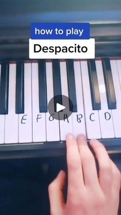 someone is playing the piano with their finger on it's keyboard and then pressing keys to play despaccito