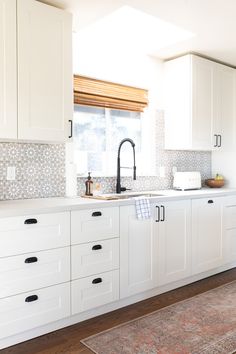 the kitchen is clean and ready for us to use in its new owner's home