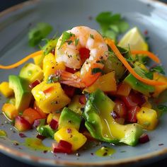 a white plate topped with salad and shrimp