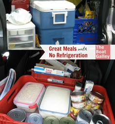 the back of a car filled with lots of food and containers, including canned meats