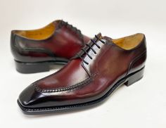 Style: 20141-2002-Burgundy Simple, Elegant, Stunning! Completely Handmade, this Hand Burnished Calfskin lace-up oxford from the Ugo Vasare collection features Goodyear Welted construction, soft Calfskin lining, cushioned insole, Split-Toe, a stitched welt and a full Leather sole! Matching Belt Available. Don't see your size? Call us to arrange a Special Order in Your Size. Luxury Lace-up Derby Shoes For Formal Occasions, Luxury Lace-up Derby For Formal Occasions, Luxury Formal Lace-up Derby Shoes, Elegant Burgundy Dress Shoes For Galas, Luxury Burgundy Oxfords For Formal Occasions, Luxury Burgundy Oxfords, Luxury Burgundy Dress Shoes For Formal Occasions, Luxury Burgundy Wingtip Dress Shoes, Elegant Burgundy Oxfords For Formal Wear