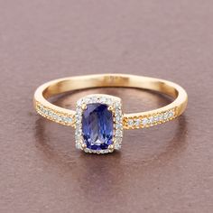 "Solid 14K Yellow Gold Ring, Cushion Cut Tanzanite Ring, Tanzanite Halo Ring, 14kt Yellow Gold Ring, Gold Ring For Women, Bridesmaid Gift Get everyone talking with this dramatic halo ring set with cushion tanzanite gemstones. This gorgeous ring is made of 14k yellow gold with fine finish. The natural gemstones have a combined weight of 0.63 ct. t.w. and offer an irrepressible sparkle that will never lose its bloom! This ring is a beautiful piece that deserves a place in almost any jewelry collec Formal 14k Gold Sapphire Ring With Halo Design, Gold Tanzanite Ring With Halo Setting, Gold Tanzanite Birthstone Ring For Formal Occasions, Gold Tanzanite Birthstone Ring For Formal Events, Formal Yellow Gold Tanzanite Birthstone Ring, Gold Ring For Women, Blue Topaz Jewelry, Ring Cushion, Cushion Cut Ring