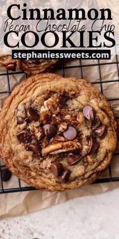 two chocolate chip cookies sitting on top of a cooling rack with the words cinnamon vegan chocolate chip cookies