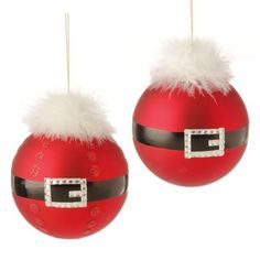 two red ornaments with white fur on them