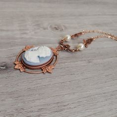 Blue Cameo Necklace For Formal Occasions, Bronze Cameo Pendant Jewelry, Elegant Rose Gold Cameo Necklace, Resin Light, Victorian Cameo, Brass Components, Necklace Rose Gold, Oxidized Copper, Katherine Pierce