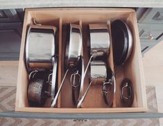 an open box containing several different types of kitchen utensils