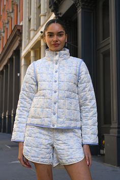 Made from recycled fabric, our lightweight Amelia Quilted Jacket features our original Blue Toile print. Designed as a convertible piece, the Amelia Jacket can be worn as-is or turned into� a vest by removing the sleeves. Off-white base with baby blue florals Soft matte quilted fabric  Removable sleeves and functional f Quilted Jacket Outfit, Femininity Style, Elevated Fashion, Toile Print, Removable Sleeves, Blue Toile, Blue Florals, Black Femininity, Quilted Fabric