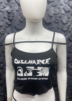 This is a black sleeveless strappy Discharge cropped tank top with a bandana style front. This has a Discharge image screen printed on the front. 91% polyester/ 9% elastane These are handmade screenprinted and slightly vary from the photo. Please feel free to email me any questions. Thanks for looking. The seller is not responsible for any lost or stolen packages. Edgy Stretch Crop Top, Stretch Punk Crop Top For Streetwear, Sleeveless Stretch Punk Crop Top, Stretch Cropped Punk Tops, Punk Style Stretch Cropped Tops, Edgy Stretch Crop Top For Alternative Fashion, Punk Style Cropped Stretch Tops, Stretch Cropped Top For Alternative Fashion, Stretch Cropped Crop Top For Alternative Fashion