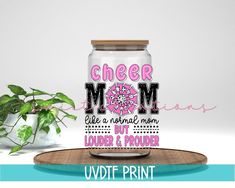 a mason jar with the words cheer mom like a normal mom, but louder and proud