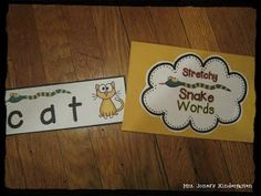 two cards with words and pictures on them, one has a cat and the other has a snake