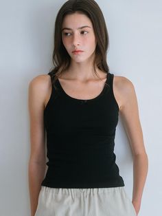 Composition : 67% cotton, 28.5% polyurethane 4.5%Color: BlackCountry of Origin : Republic of Korea Basic Sleeveless Vest For Everyday, Basic Sleeveless Everyday Vest, Basic Everyday Sleeveless Vest, Cotton Vest With Tank Straps For Spring, Basic Black Vest Top, Spring Cotton Vest With Tank Straps, Basic Black Sleeveless Tank Top, Solid Color Sleeveless Camisole For Everyday, Basic Black Sleeveless Camisole