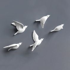 PRICES MAY VARY. Beautiful meaning: 5 white doves of peace in different poses, lifelike, bring good luck and good luck to your family. Doves of love can also bring peace, love and equality to the family. Unique Design Wall Art: Inspired Design and Hand Painted. The best choice for living room and bedroom. Nice decoration above the table or stairs. A great gift for parents and friends. High Quality Material: Hand painted resin dove wall sculpture, fresh and bright color, natural and artistic desi Dove Decor, Dove Sculpture, School Reference, Birds Sculpture, 3d Wall Art Sculpture, Bird Sculptures, Beautiful Meaning, Golden Wall, Friends High