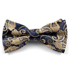 a blue bow tie with gold paisley on it