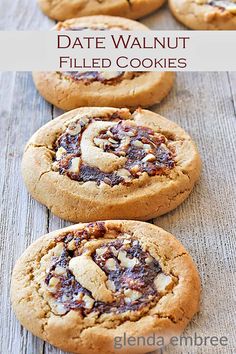 chocolate chip cookies are arranged in rows on a wooden table with text overlay that reads date walnut filled cookies