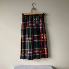 Deadstock with tags, girls traditional tartan kilt by Stoodley Knowle. Waist 24 inches L 24 inches, 59cm. Polyester and viscose mix with Teflon fabric protector, KK Bespoke schoolwear. Lovely kilt with apron front, stitched down pleats, leather straps with buckles. Excellent unworn vintage condition. For more vintage clothes and accessories visit my shop https://www.etsy.com/uk/shop/coolclobber Scottish Plaid Skirt For Winter, Winter Scottish Plaid Skirt, Scottish Style Fitted Skirt For School, Scottish Fitted Skirt For School, Fitted Scottish Skirt For School, Fitted Scottish Pleated Skirt, Fabric Protector, Kilt Skirt, Tartan Kilt