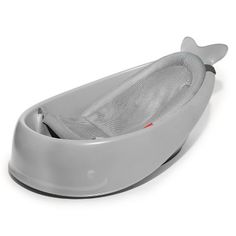 the baby bathtub is designed to look like a whale