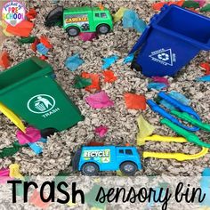 trash cans and toys on the floor with words trash sensory fun for toddlers to play with