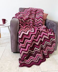 a couch with a blanket on top of it