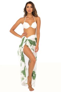 Island inspired white with black Hibiscus Bali sarong swimsuit cover up, gives you style and comfort at the beach, poolside, lounging on a hot summer day or on your next tropical vacation. Fringe on the edges give it a spirited bohemian feel. And the pretty sequins on the flower pistil brings a hint of sparkle to your beach look . Includes a coconut shell clip for easy tying; just put an edge of the fabric in the two holes and pull through for a perfect fit. Length can be adjusted by simply folding the garment down. One size fits most. Measures 67” x 45”. Made from 100% silky soft, breathable, easy care rayon. Rayon is moisture absorbent (more so than cotton), so this beach skirt will keep you cool and comfortable. Quick-drying rayon makes this the perfect beach wear for vacation or travel Sarong Clip, Sarong Swimsuit Cover, Floral Bathing Suit, Floral Bathing Suits, Sarong Wrap, Skirt Coverup, Loungewear Dresses, Beach Skirt, Bathing Suit Cover Up