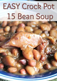 an easy crock pot 15 bean soup with chicken and beans in a blue bowl