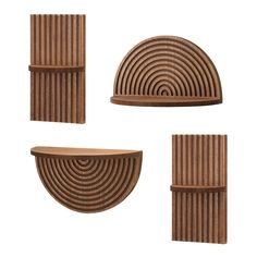 three pieces of wood are arranged in the shape of spirals and rectangles