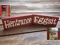 a wooden sign sitting on top of a wooden table