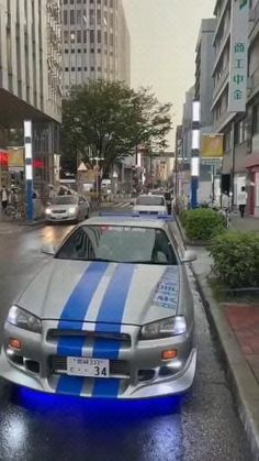 several cars are parked on the side of the street