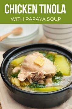 chicken tinola with papaya soup in a black bowl