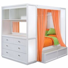 a bed with an orange and green cover on it's headboard is next to a white dresser