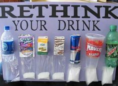 a sign that says, rethink your drink on the side of a table