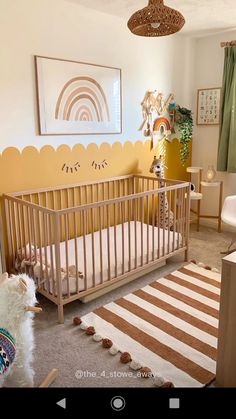 a baby's room with an animal themed crib