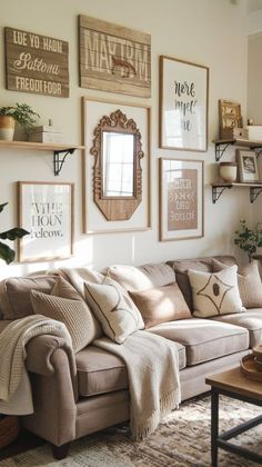 a living room filled with lots of furniture and pictures on the wall above it's couch