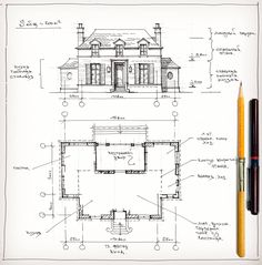 a drawing of a house with blueprints on it