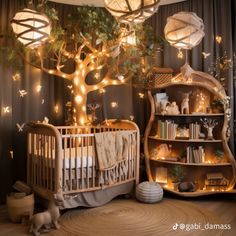 a baby's room with a tree and lights on the wall, in front of a crib