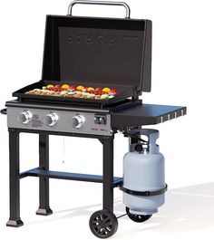 an outdoor grill with a propane burner on the side and food cooking on top