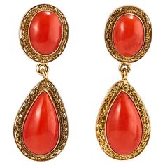 Pair of 18K Yellow Gold and Coral Drop Earrings Made in Italy in the 80s. Beautiful coral gold earrings with an antique look. Each earring has 2 corals, an oval one on the top and a pear shape one on the part that drops. Total weight: 6.05 grams. Length: 3 cm Coral Drop Earrings, Coral And Gold, The 80s, Pear Shaped, Gold Earrings, Coral, Jewelry Earrings, Jewelry Making, Yellow Gold