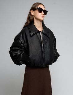 Black faux-leather crop bomber style jacket with oversized lapel. Brand Pixie Market50% polyester, 50% viscoseFully lined Oversized crop fitDropped shouldersBalloon sleeves Wide ribbed sleeve cuff Gathered elastic waist Model is wearing one size and model's height is 5.9"Imported 2023 Wishlist, Pixie Market, December 2023, Black Faux Leather, Leather Fashion, Best Sellers, Elastic Waist, Bomber Jacket, Faux Leather