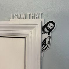 a sticker that says i saw that on the wall next to an open door