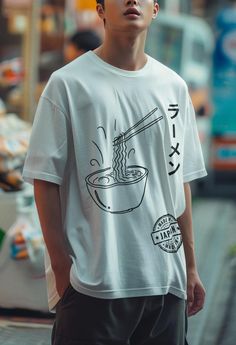 This Japanese Ramen T-Shirt features a retro noodles bowl graphic in cute Kawaii style, making it a perfect gift for foodies and Japan lovers. The anime design gives off a fun and vibrant vibe, suitable for casual wear or as a statement piece. Ideal for those who appreciate Japanese culture and enjoy unique and quirky fashion. Perfect for birthdays, Christmas, or any occasion for food lovers and anime enthusiasts. Product features - Shoulder tape for stability - Tubular knit without side seams - Noodles Bowl, Style Kawaii, Japanese Ramen, Style Anime, Anime Design, Kawaii Style, Quirky Fashion, Noodle Bowls, Foodie Gifts