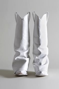 Mid Cowboy Boot with white leather toe and white leather sleeve. Two inch heel with pointed toe. Color: White Tall Cowboy style boot 100% Leather sleeve Made in Italy R13S0107-S002A This style runs slightly small. If in between sizes, we recommend sizing up. White Goth, Fold Over Boots, Fashion Cowboy Boots, Open Toe Boots, Preformance Outfits, Cowboy Outfits, Futuristic Fashion, Cowboy Style, Denim Shoes