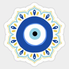 an eyeball sticker with blue and yellow designs on the bottom, in front of a white background