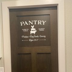 a door with the name pantry painted on it