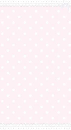 a pink background with white polka dots