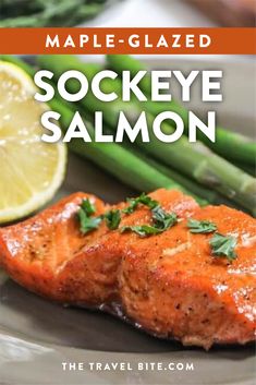 salmon and asparagus on a plate with the title maple - glazed sockeye salmon