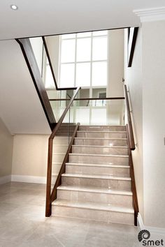 an empty staircase leading up to the second floor