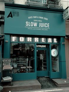 the front of a restaurant called slow juice