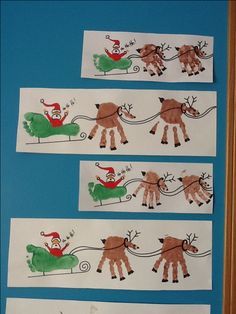 four handprints depicting santa and reindeer pulling a sleigh