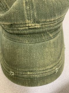 Green adjustable fashion hat. Trendy Visor Snapback Hat For Spring, Trendy Distressed Visor Baseball Cap, Trendy Hats With Curved Brim, Trendy Cotton Flat Cap Trucker Hat, Trendy Adjustable Visor Snapback Hat, Trendy Adjustable Visor Hats, Trendy Flat Cap Hats For Spring, Trendy Khaki Cotton Hat, Trendy Spring Flat Cap