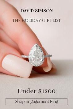 a woman's hand holding an engagement ring with the words, under $ 120 shop engagement rings